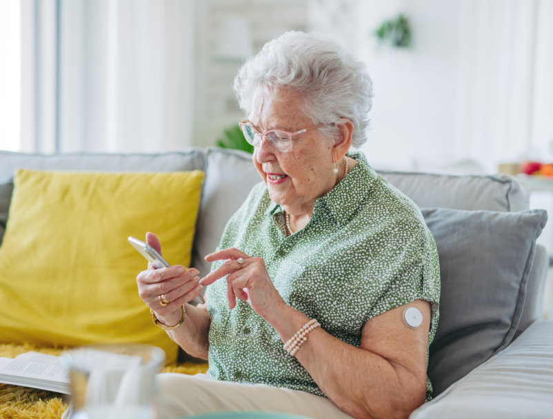 elderly woman using phone