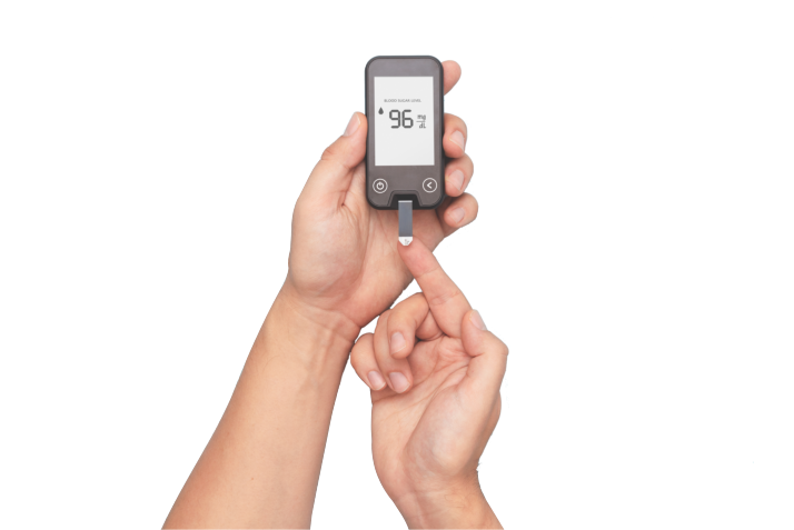 woman using blood glucose monitoring device